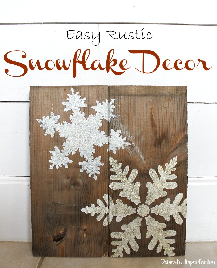 frugal way to decorate your home for winter with snowflake stenciled barn wood scrap 