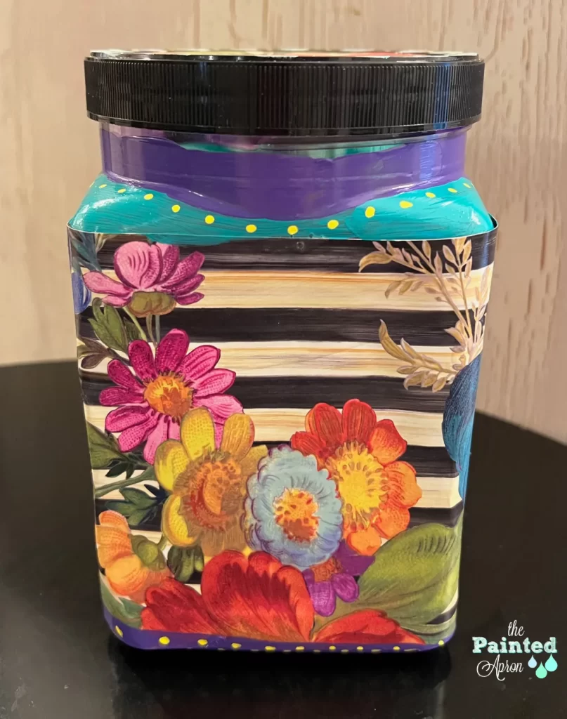 upcycled canister with bright colored paper and paint