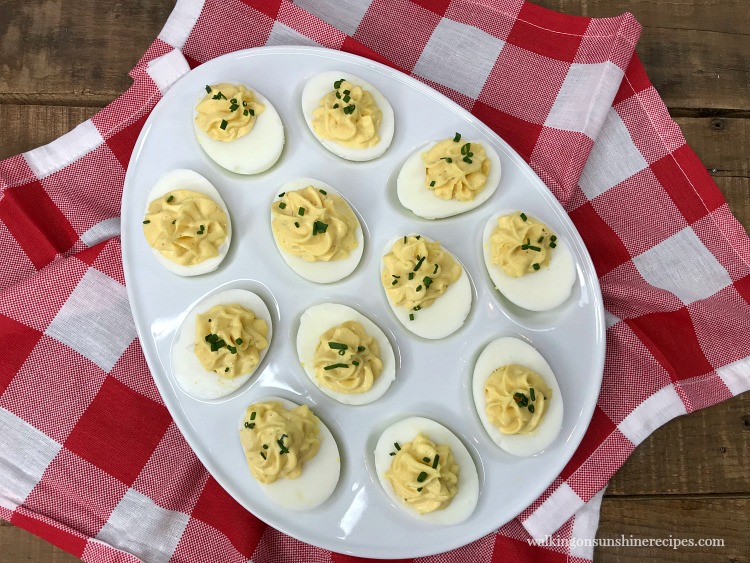 classic deviled eggs in an egg tray