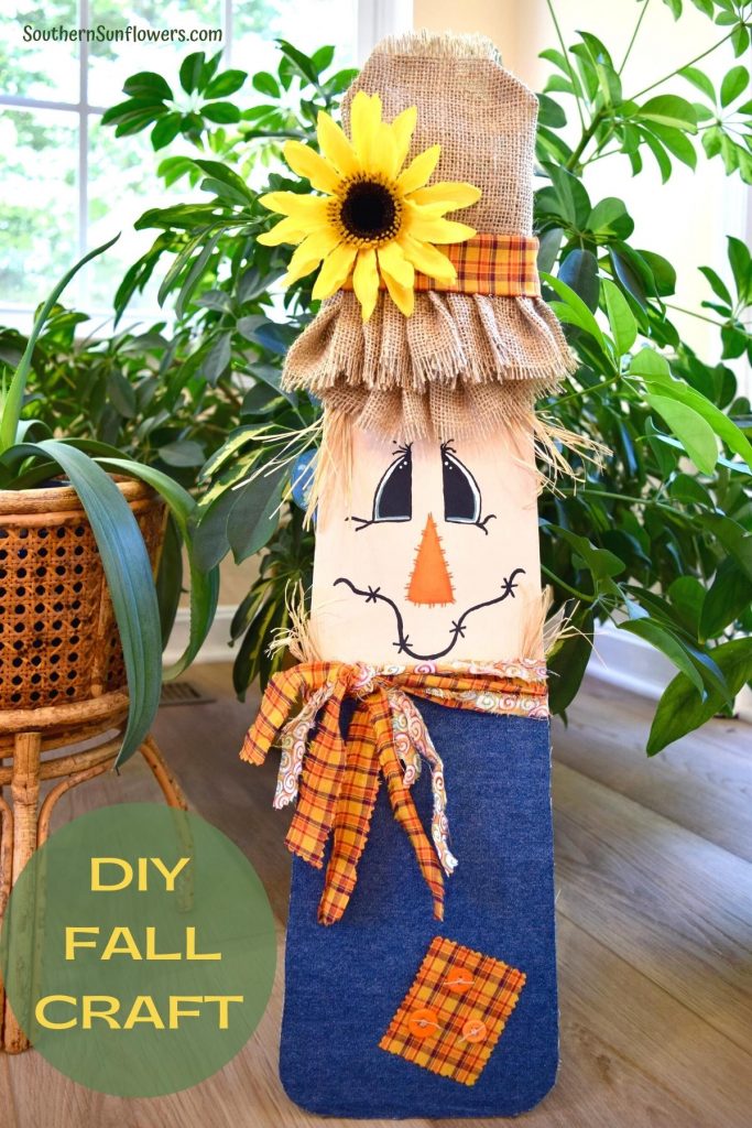 scarecrow ceiling fan with surrounding greenery plants