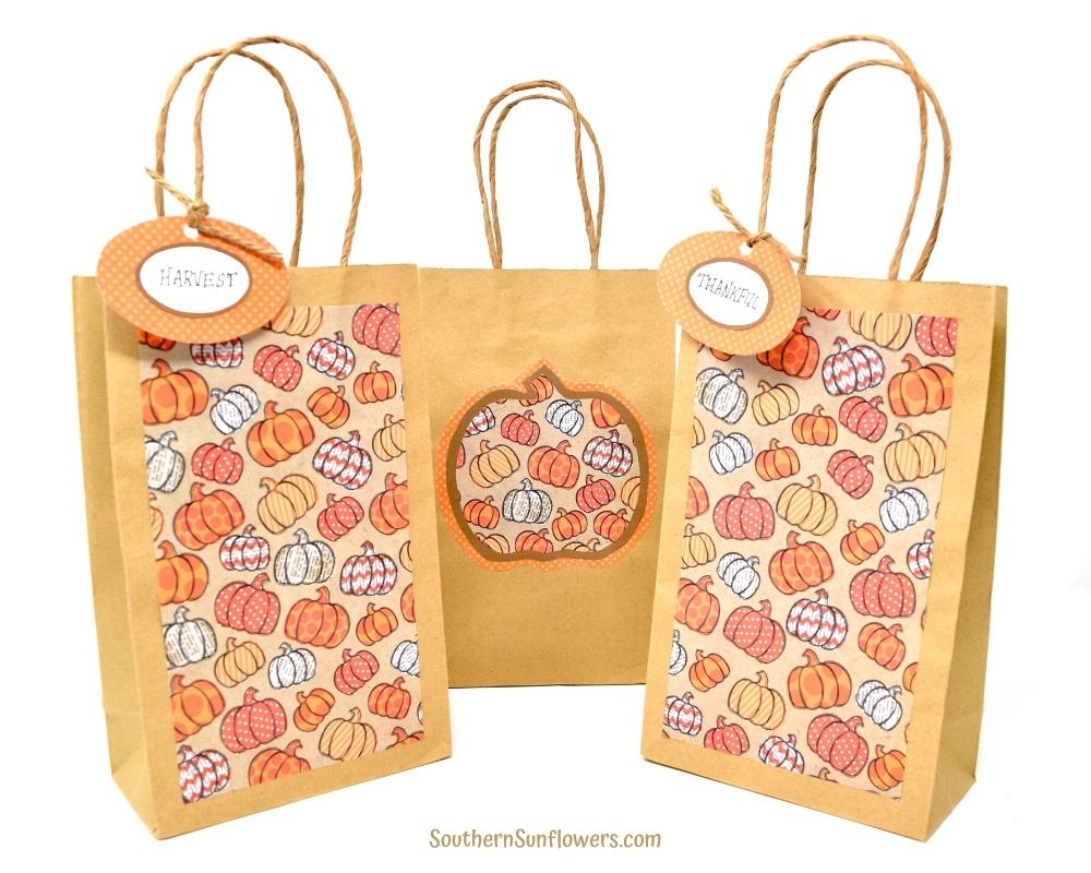 3 decorated plain gift bags for fall