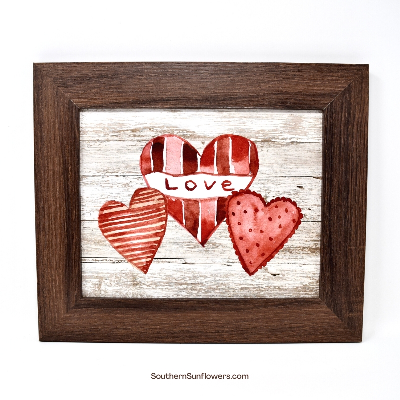 free valentine wall art farmhouse styled shown in a brown frame