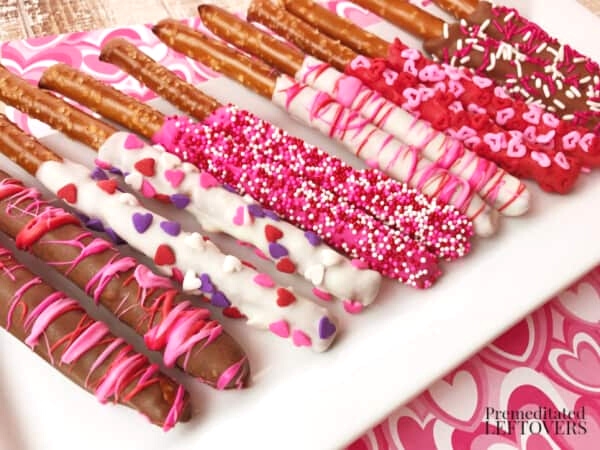 chocolate dipped pretzels decorated for valentine's day featured at the Valentine Hearts and Sweets home matters link party