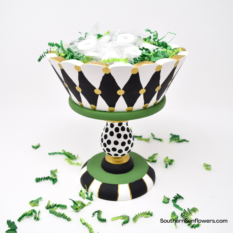completed thrift store pedestal bowl makeover in green, black, white with metallic gold accents