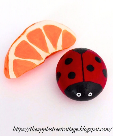 painted orange slice and ladybug kindness rocks were featured at the home matters link party this week
