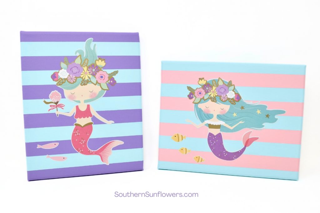 completed dollar tree canvas idea using stickers ~ painted stripes with mermaids